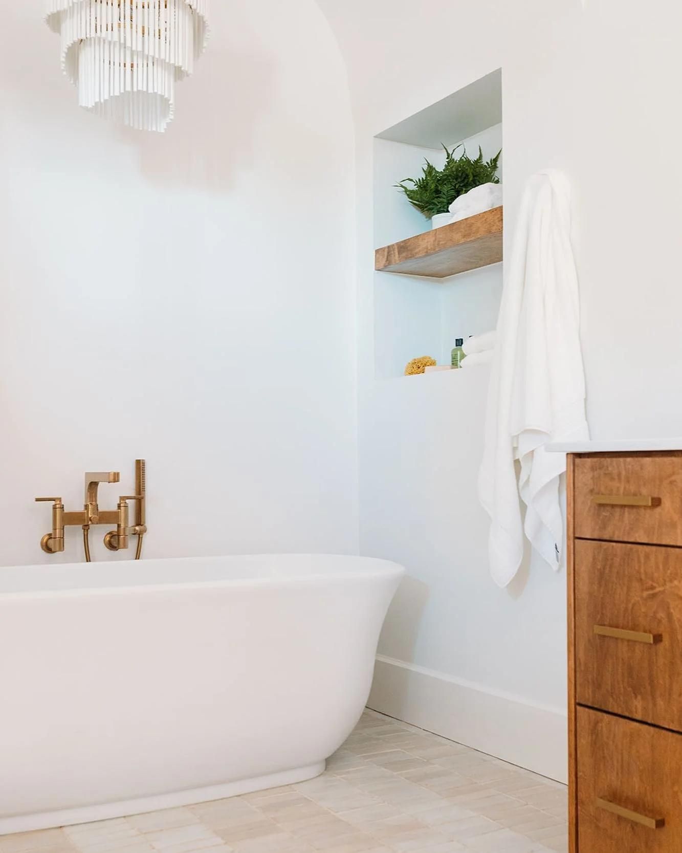 Bath - white tub wood cabinets