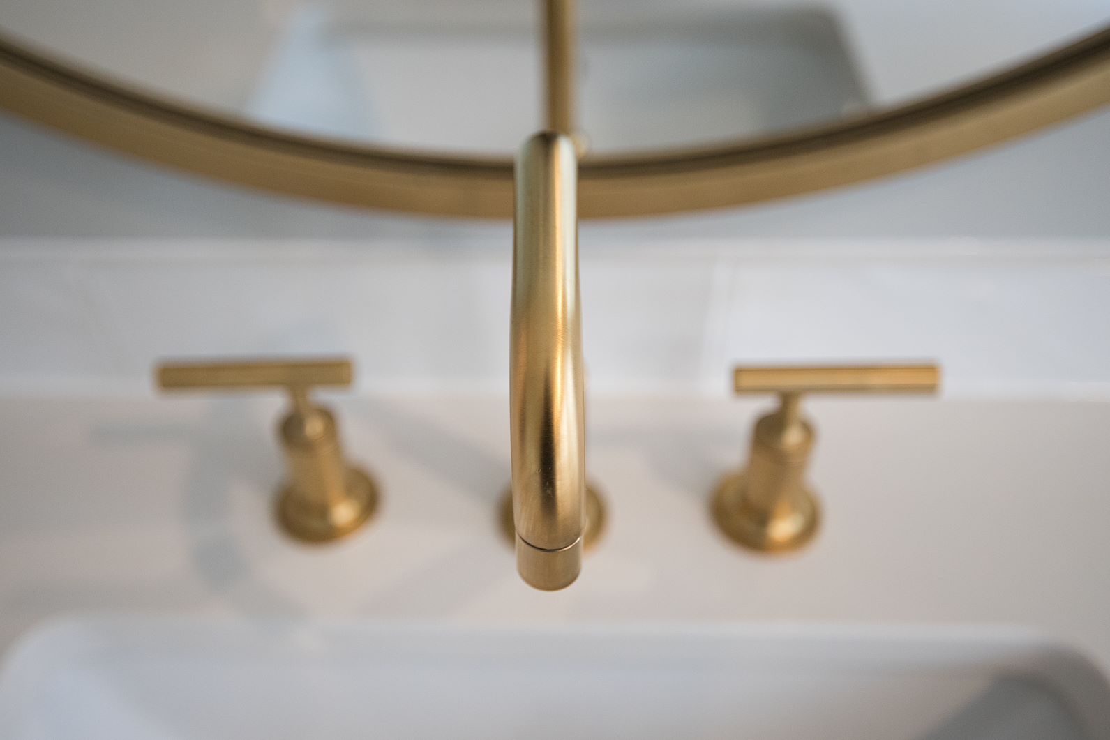 premier plumbing gold faucet image